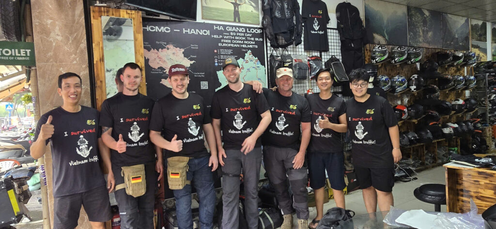 happy customers in tshirts at the stlye motorbikes hcm shop